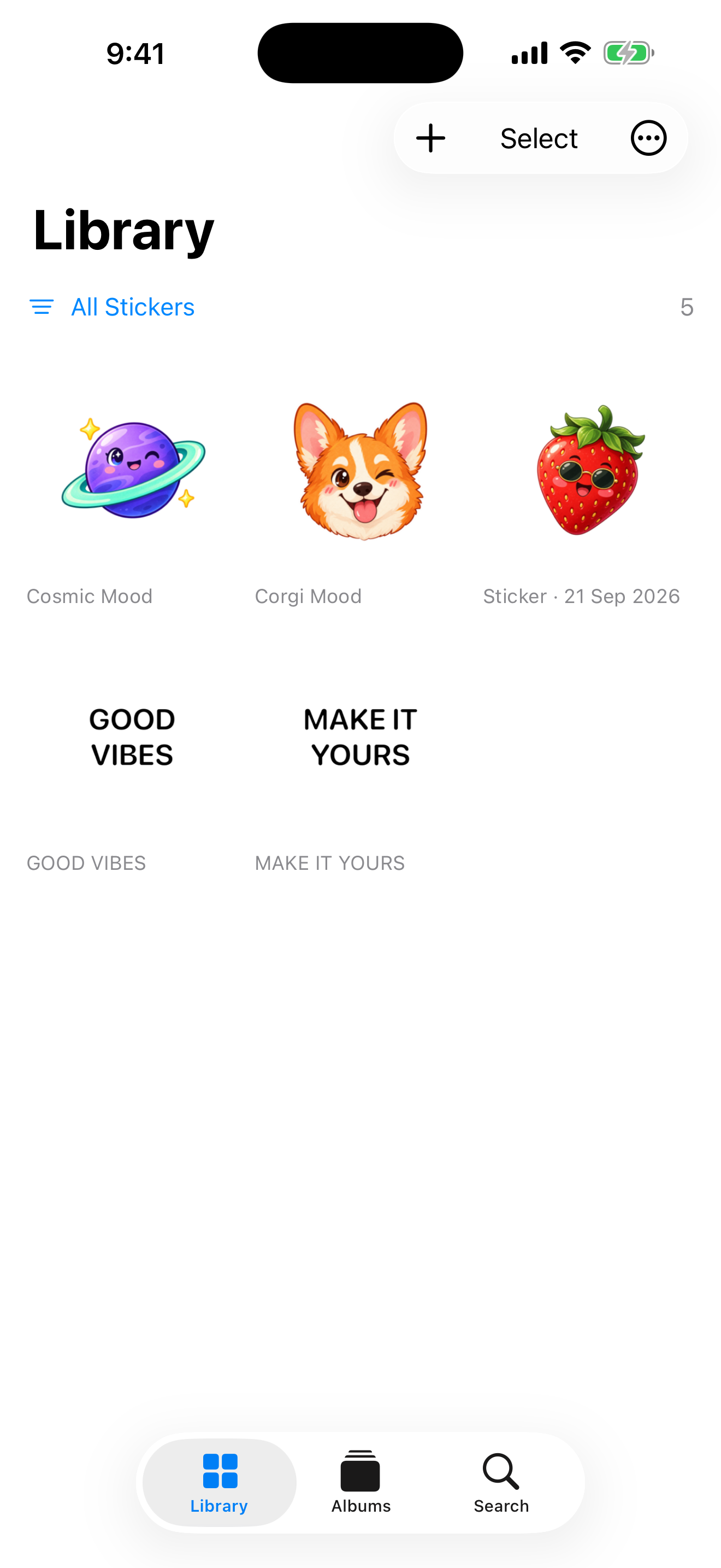 Actual sticker library with planet, corgi, strawberry, and text stickers